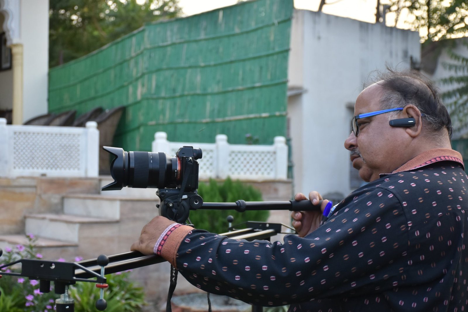 Harish Moolchandani filming a wedding on a camera slider