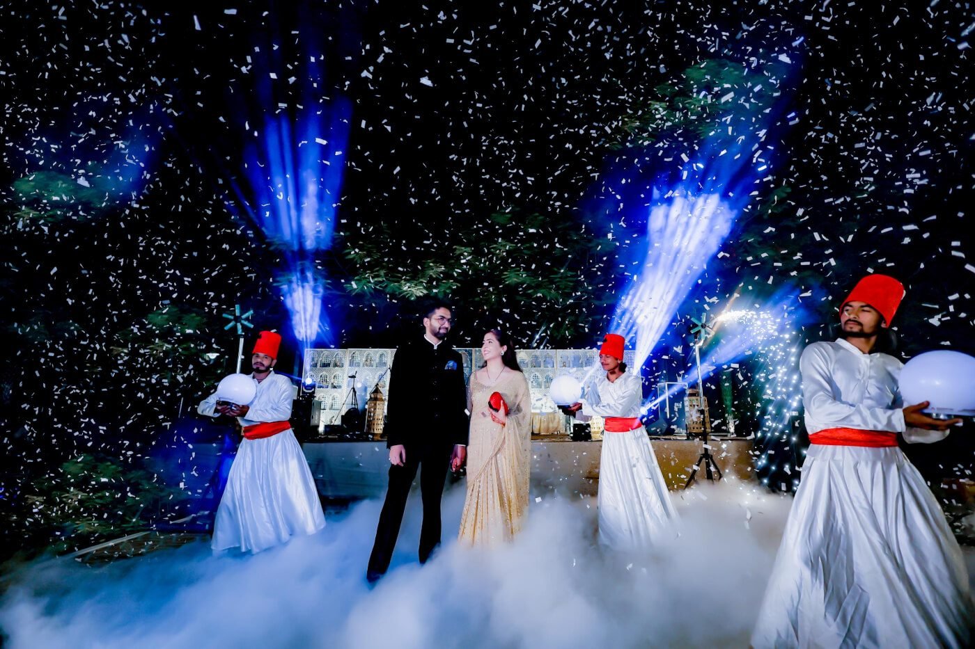Couple entry with dervish dancers — wedding shot by Priya Movies & Events